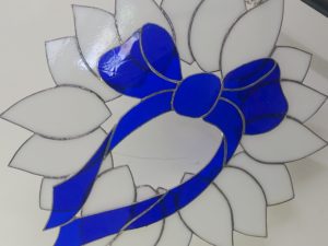 White Wreath with Blue Bow